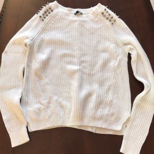 Creme express sweater with studded shoulders